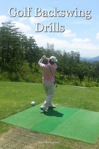 Player working on some golf backswing drills